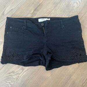 Black Jean shorts with cutouts